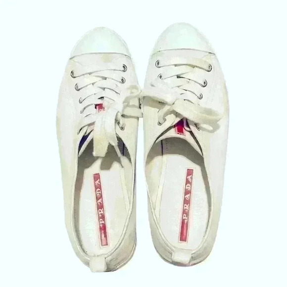 Prada sneakers. 3E4739 Size 9. White leather. Red Prada stripe. Lace - Picture 1 of 7